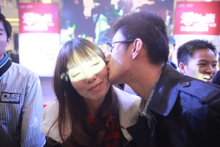 The longest kissing chain was achieved by 351 participants at an event organized by Jiayuan.com (China) in Beijing, China, on 11 November 2011 to celebrate Guinness World Records 2011.